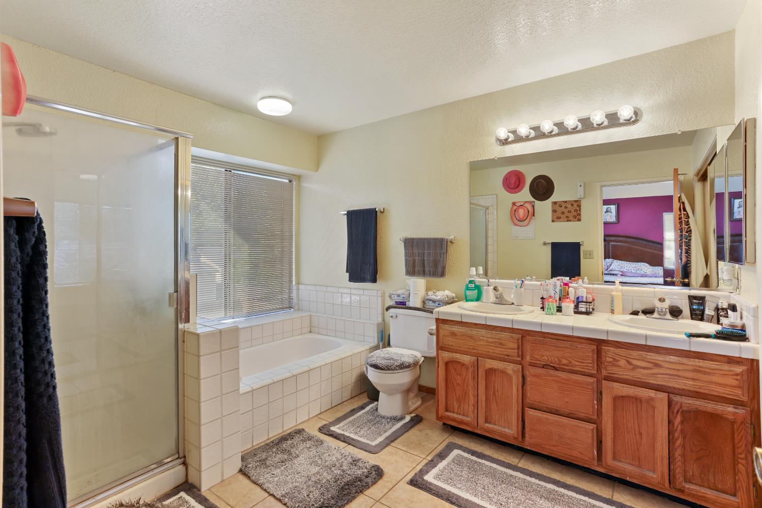 2008 Sheldon Drive Modesto, CA 95350 - Photo 24 of 39 a spacious bathroom with a double vanity sink mirror and toilet