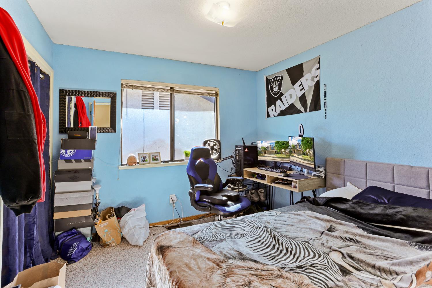 2008 Sheldon Drive Modesto, CA 95350 - Photo 27 of 39 a bedroom with a bed and wooden floor