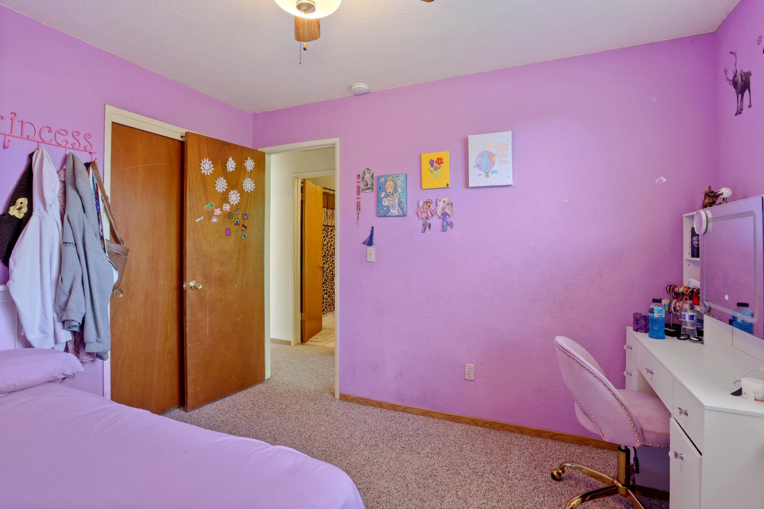 2008 Sheldon Drive Modesto, CA 95350 - Photo 31 of 39 a bedroom with a pink bed and a dresser