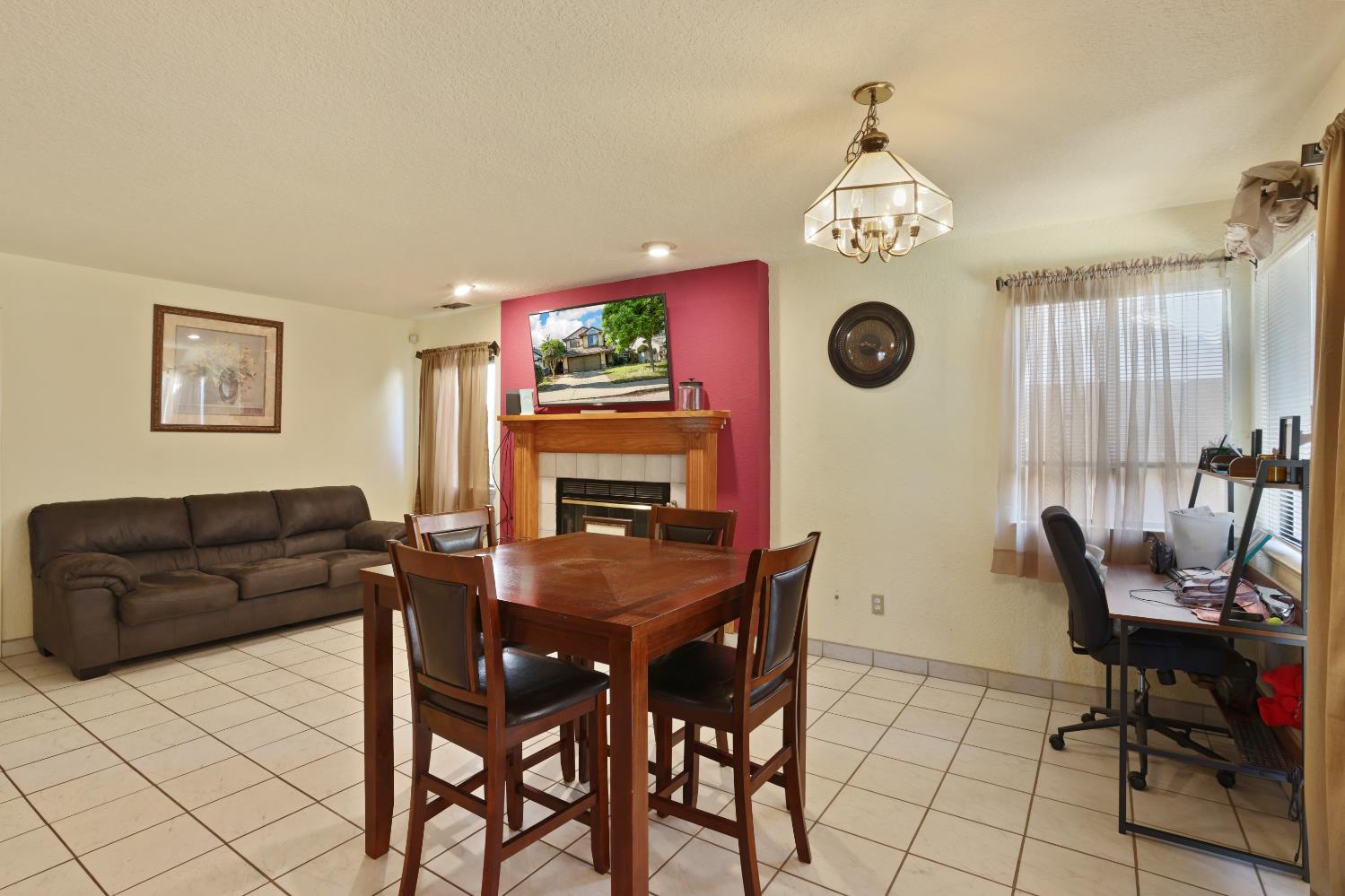 2008 Sheldon Drive Modesto, CA 95350 - Photo 8 of 39 a view of a dining room with furniture and a chandelier