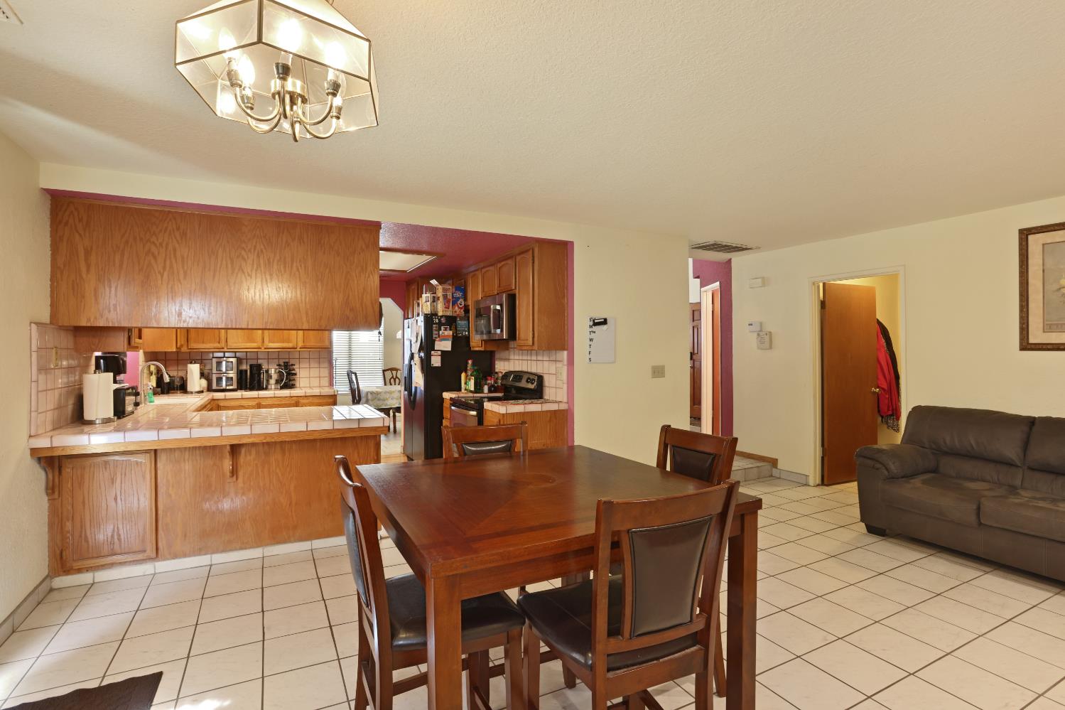 2008 Sheldon Drive Modesto, CA 95350 - Photo 9 of 39 a view of a dining room with furniture