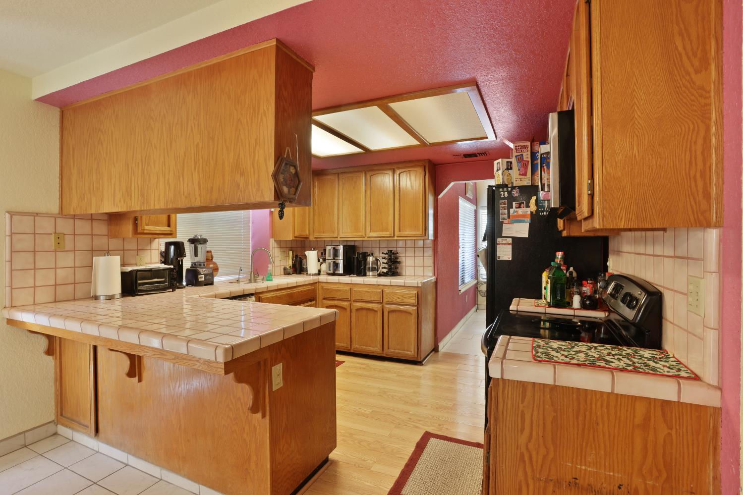 2008 Sheldon Drive Modesto, CA 95350 - Photo 10 of 39 a kitchen that has a sink and a stove in it