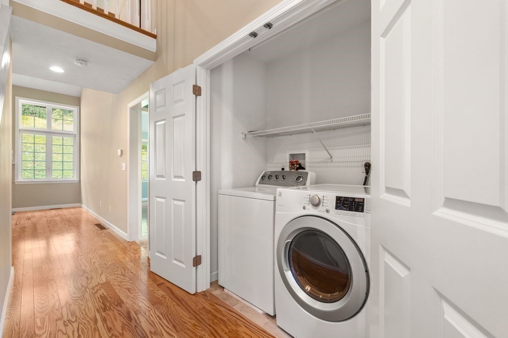 8 Reed Lane, Unit 8 Littleton, MA 01460 - Photo 15 of 37 a view of a kitchen with washer and dryer