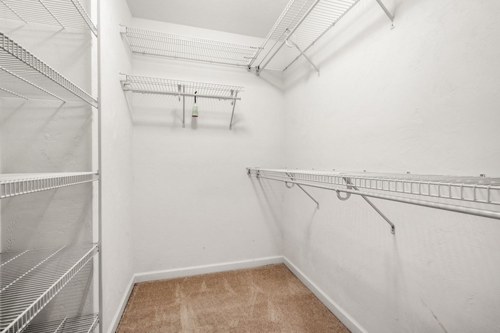 8 Reed Lane, Unit 8 Littleton, MA 01460 - Photo 21 of 37 a view of small space with racks on the wall