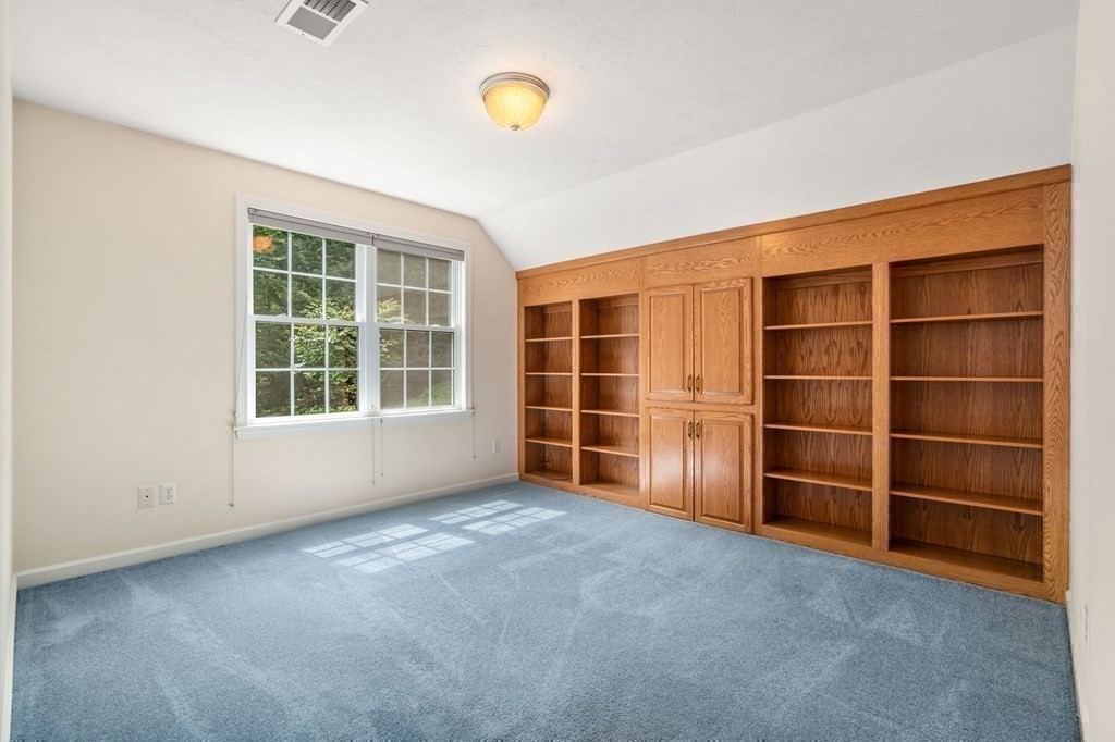8 Reed Lane, Unit 8 Littleton, MA 01460 - Photo 24 of 37 a view of an empty room with a window