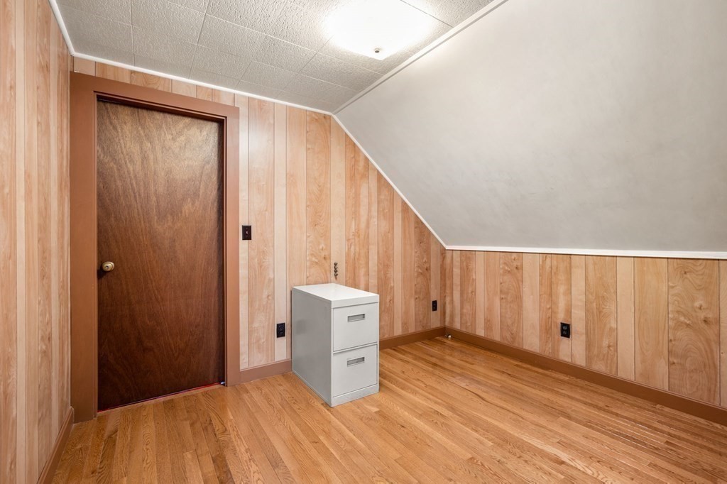 8 Reed Lane, Unit 8 Littleton, MA 01460 - Photo 28 of 37 a view of a livingroom with wooden floor