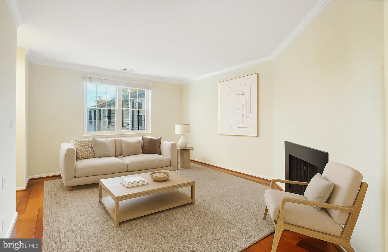 4614 28th Road South, Unit B Arlington, VA 22206 - Photo 15 of 27 a living room with furniture and a window