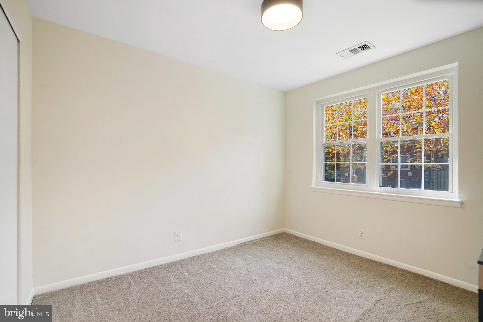 4614 28th Road South, Unit B Arlington, VA 22206 - Photo 24 of 27 a view of an empty room with a window
