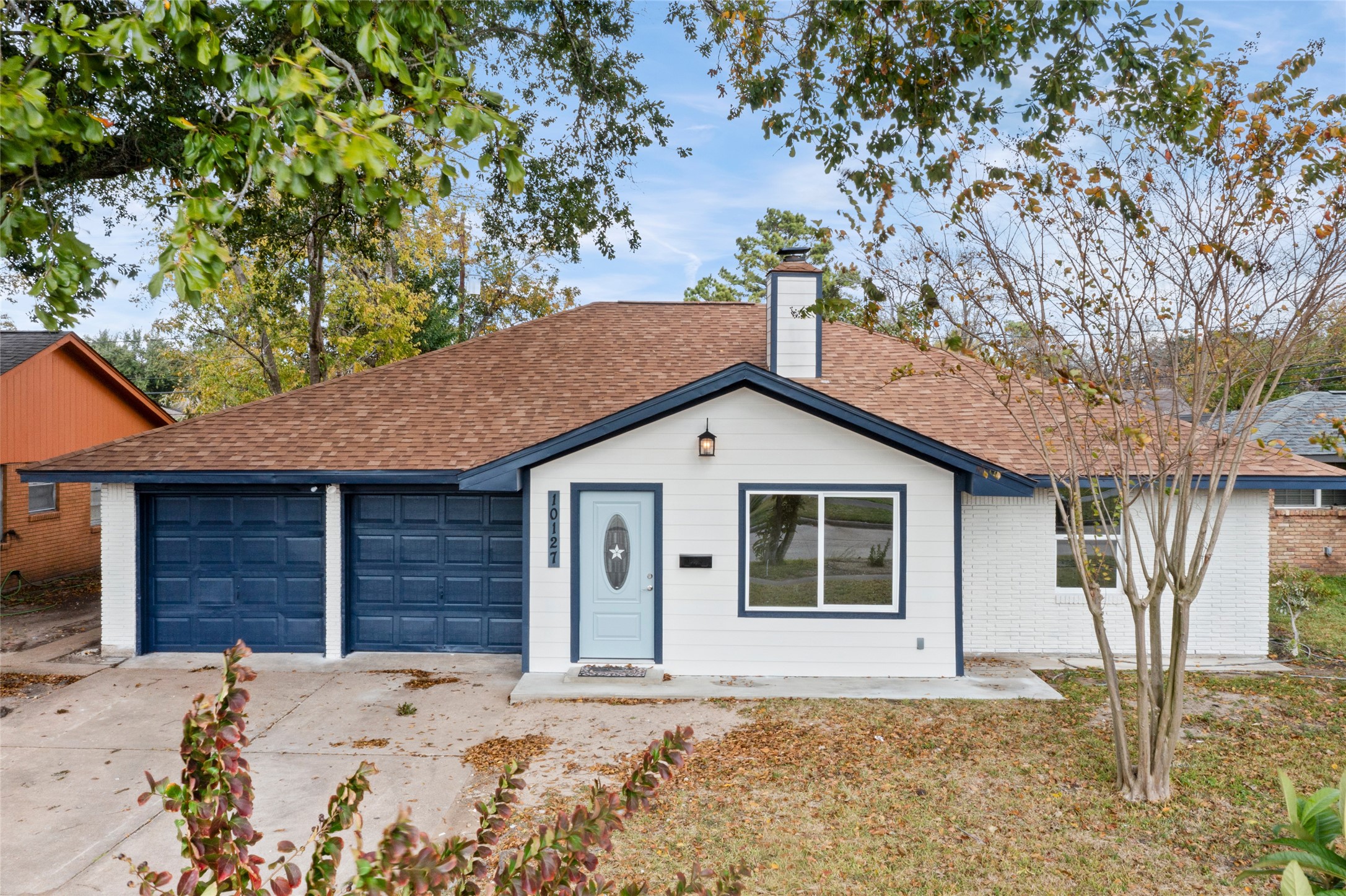 10127 Tolman Street Houston, TX 77034 - Photo 1 of 30 front view of a house with a yard