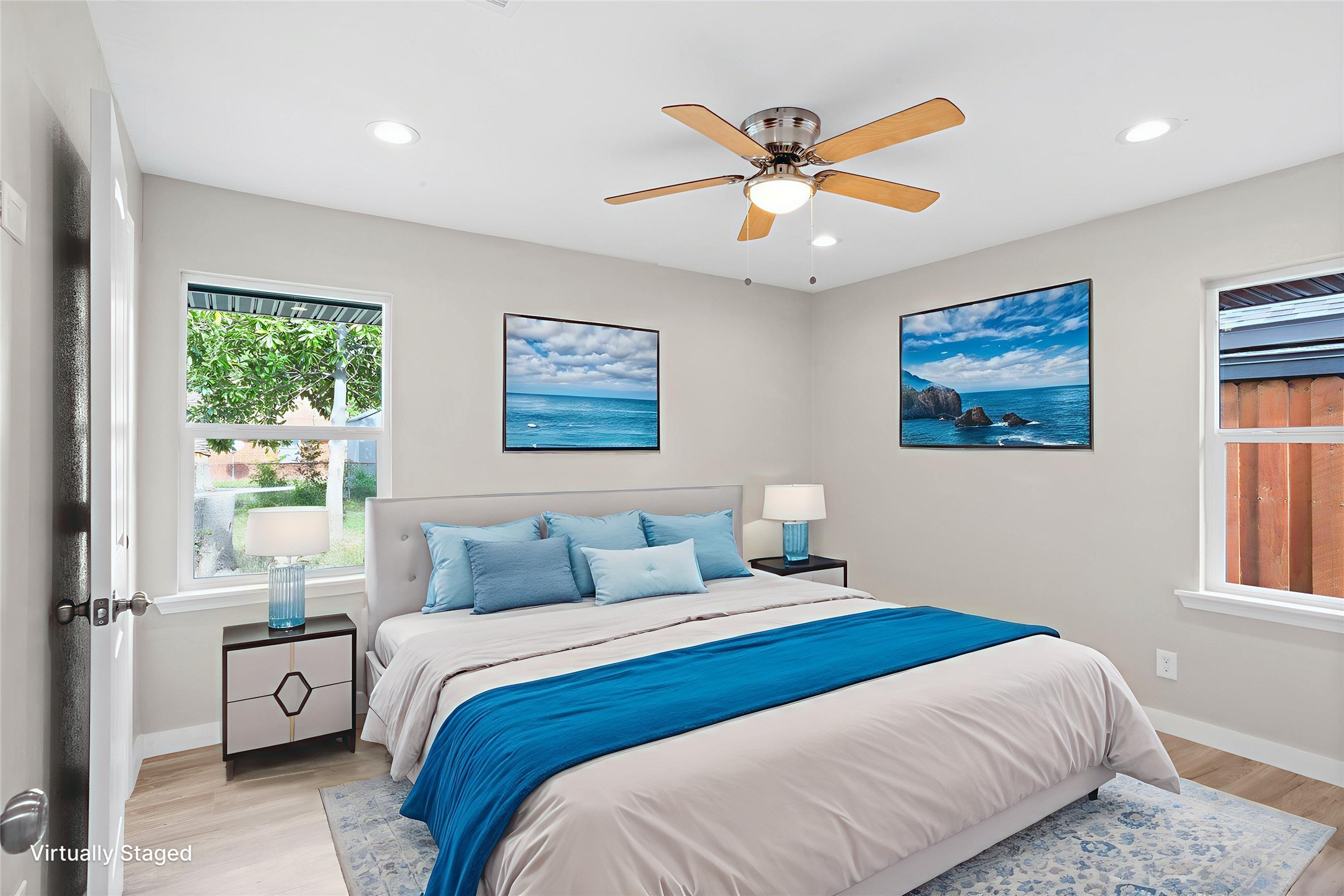 10127 Tolman Street Houston, TX 77034 - Photo 14 of 30 a bedroom with a large bed and a window