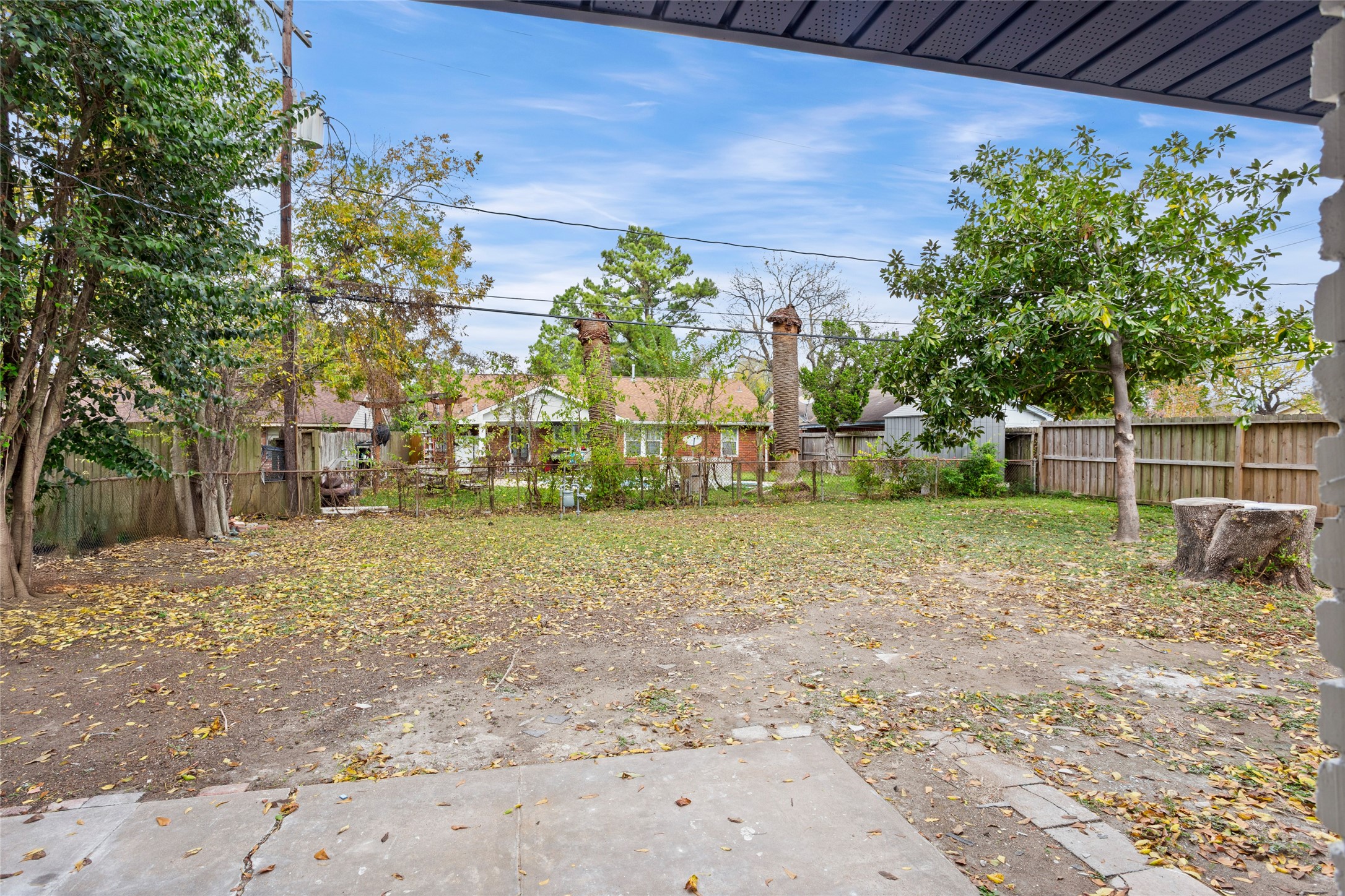 10127 Tolman Street Houston, TX 77034 - Photo 25 of 30 a view of a yard with fountain in front of it