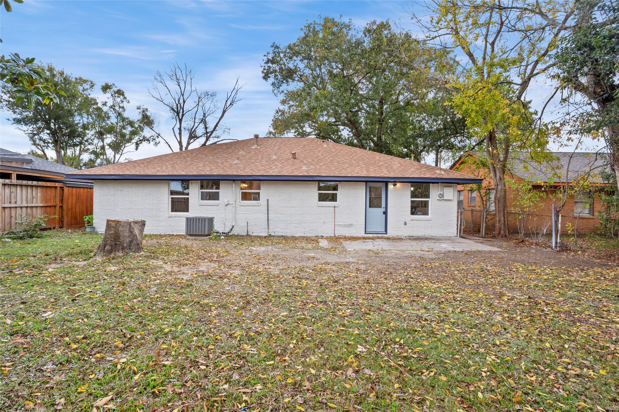 10127 Tolman Street Houston, TX 77034 - Photo 26 of 30 a house with trees in the background