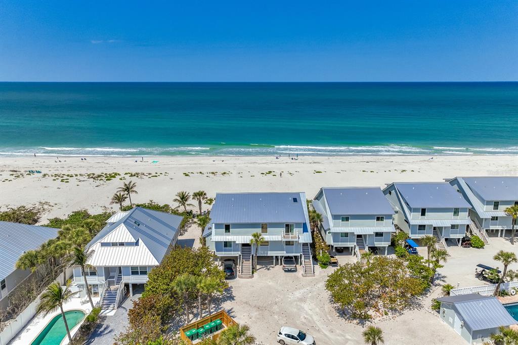 380 Gulf Boulevard, Unit 14 Boca Grande, FL 33921 - Photo 1 of 1 an aerial view of a house with a yard