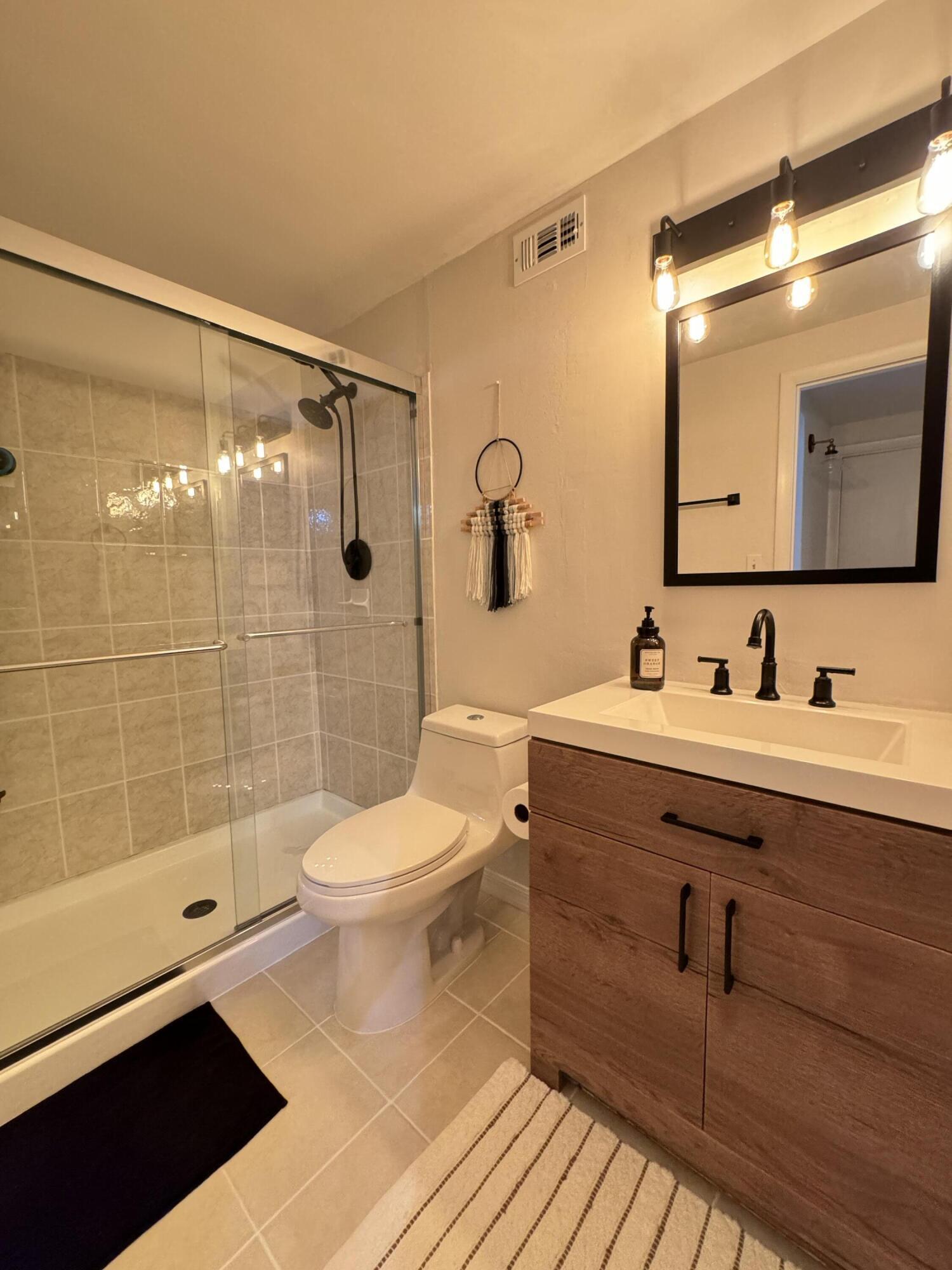4601 Northwest 2nd Avenue, Unit 805 Boca Raton, FL 33431 - Photo 21 of 34 updated master bath
