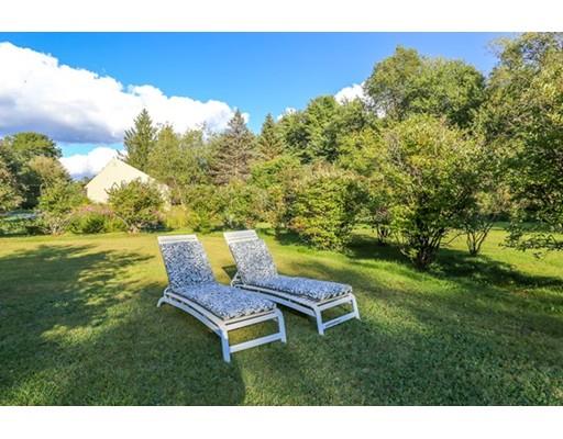 32 Ellis Road Westminster, MA 01473 - Photo 11 of 42 a backyard of a house with table and chairs