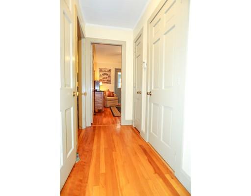 32 Ellis Road Westminster, MA 01473 - Photo 23 of 42 a view of a hallway with wooden floor and a bathroom