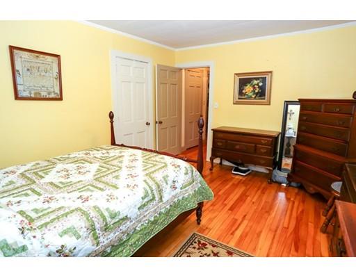 32 Ellis Road Westminster, MA 01473 - Photo 26 of 42 a bedroom with a bed and painting on the wall