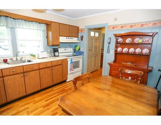 32 Ellis Road Westminster, MA 01473 - Photo 32 of 42 a bedroom with a bed and a flat tv screen on dresser