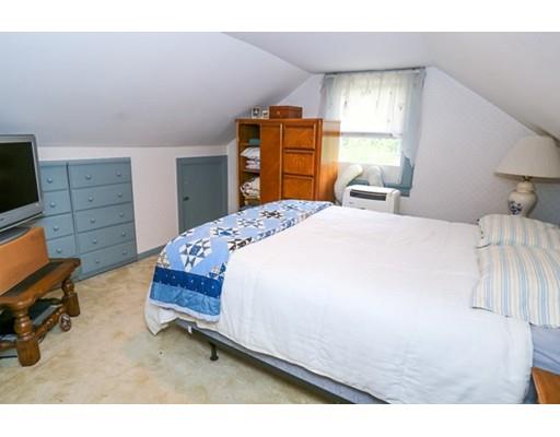 32 Ellis Road Westminster, MA 01473 - Photo 39 of 42 a bedroom with a bed and a flat tv screen on dresser
