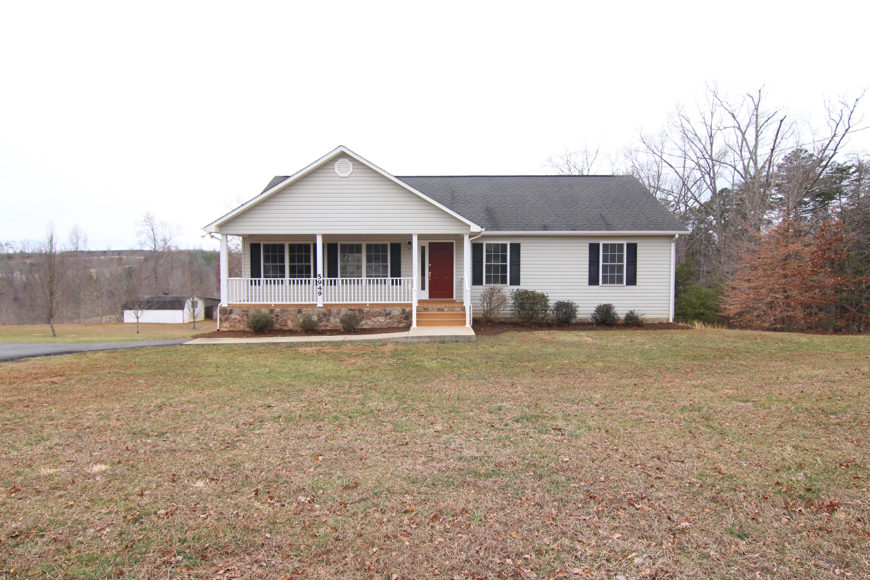 5949 Hardy Road Hardy, VA 24101 - Photo 1 of 38 a view of a house with a yard and a large tree
