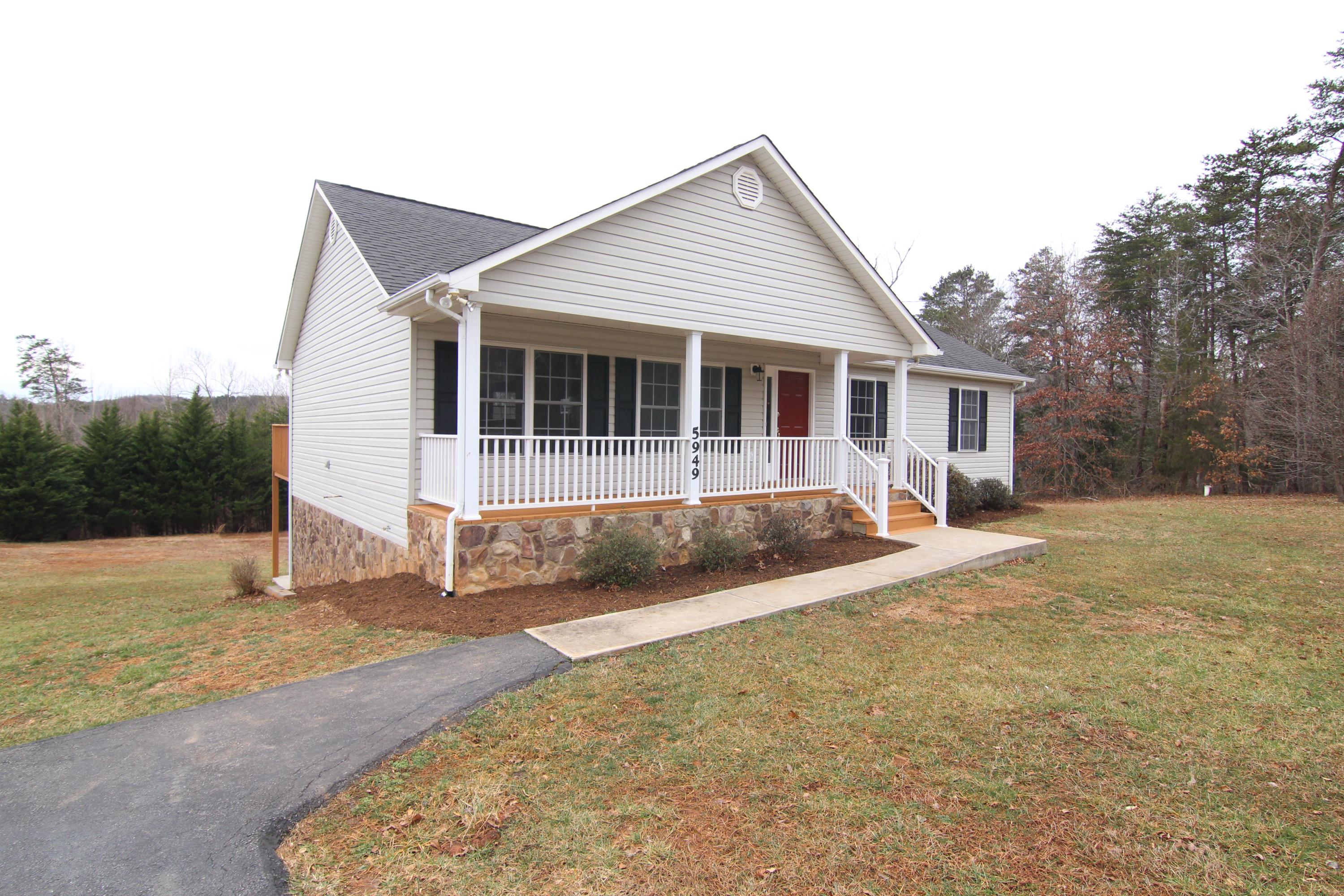 5949 Hardy Road Hardy, VA 24101 - Photo 3 of 38 a view of a house with a yard and large tree