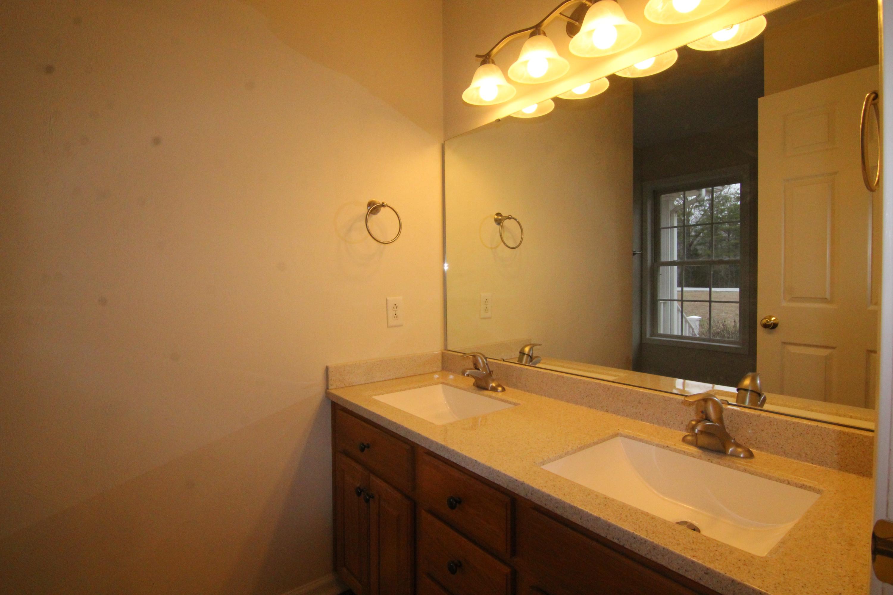 5949 Hardy Road Hardy, VA 24101 - Photo 23 of 38 a bathroom with a sink vanity and a mirror