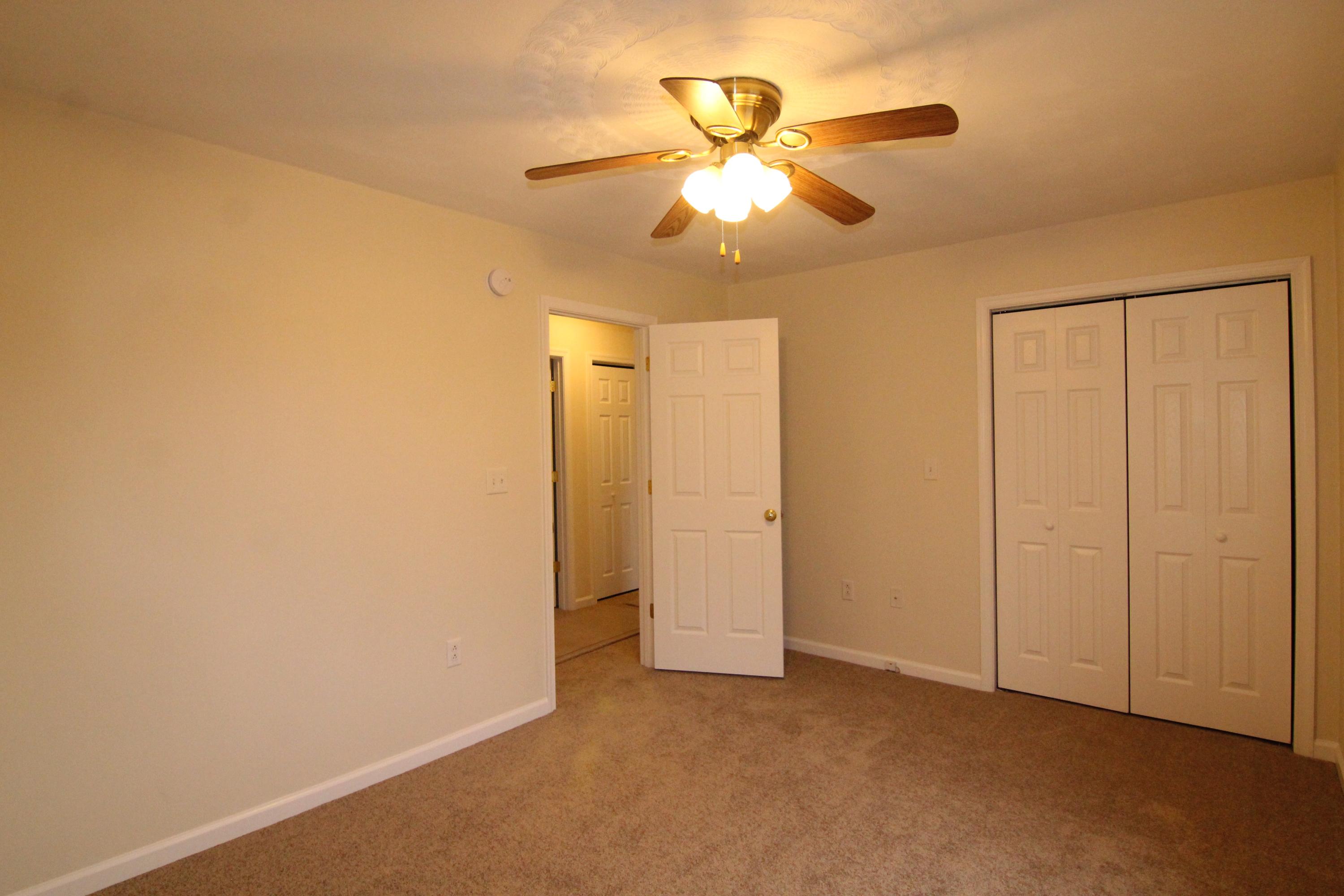 5949 Hardy Road Hardy, VA 24101 - Photo 29 of 38 an empty room with chandelier fan