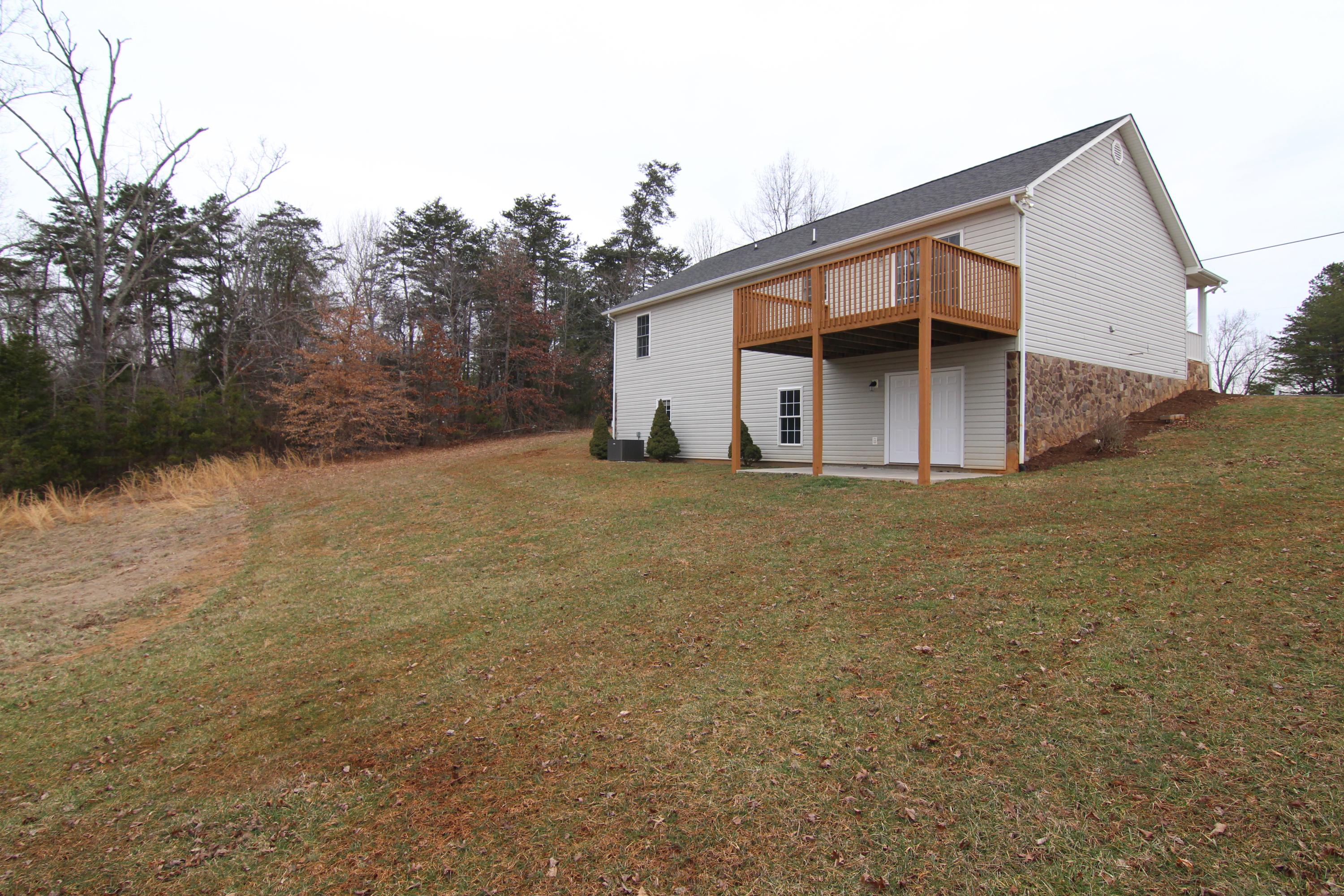 5949 Hardy Road Hardy, VA 24101 - Photo 34 of 38 a view of a house with a yard