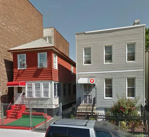 a front view of residential houses