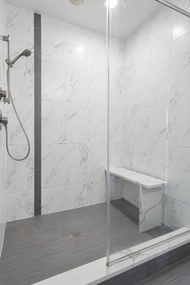 4845 North Keystone Avenue, Unit 2N Chicago, IL 60630 - Photo 13 of 21 a bathroom with a shower