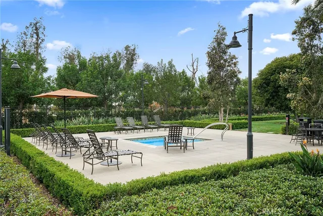 a view of a table and chairs in patio with a yard