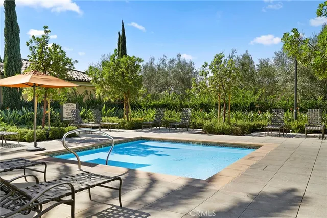 a view of a swimming pool with a patio