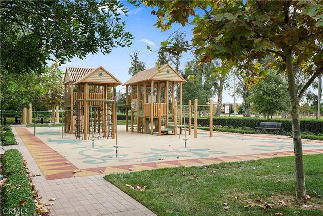 a view of a house with a backyard porch and sitting area
