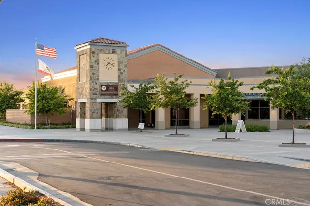 a view of a building with a palm tree