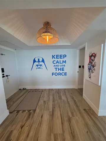 a view of a livingroom from a hallway