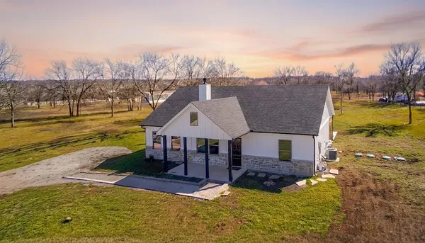 a house view with a garden space