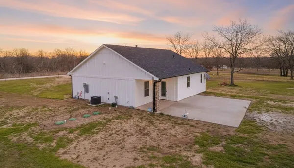 a view of swimming pool with a yard