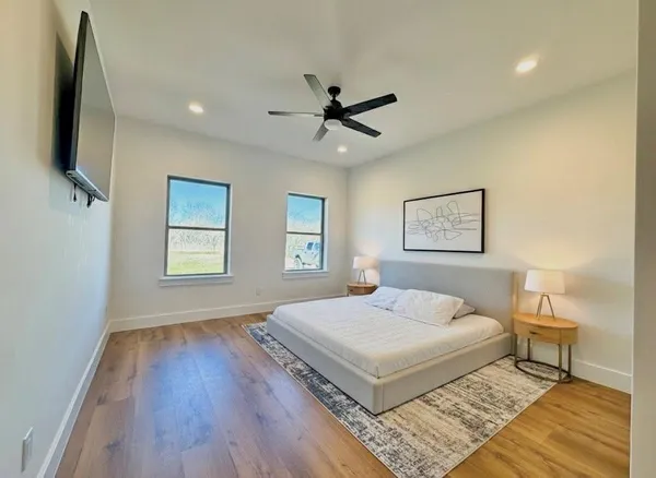 a spacious bathroom with a double vanity sink mirror and