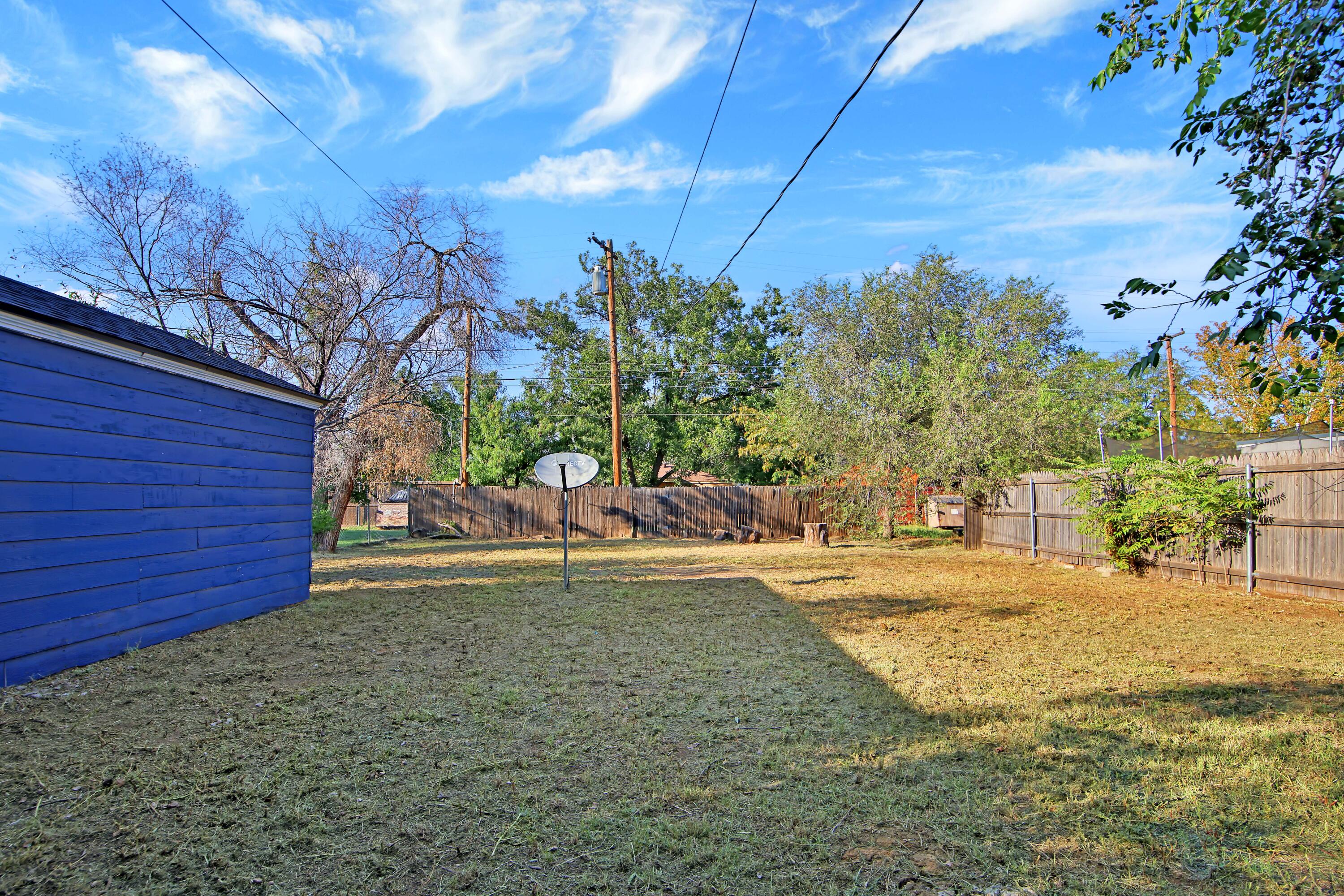 2004 31st Street Lubbock, TX 79411 - Photo 23 of 24 a view of a backyard of the house