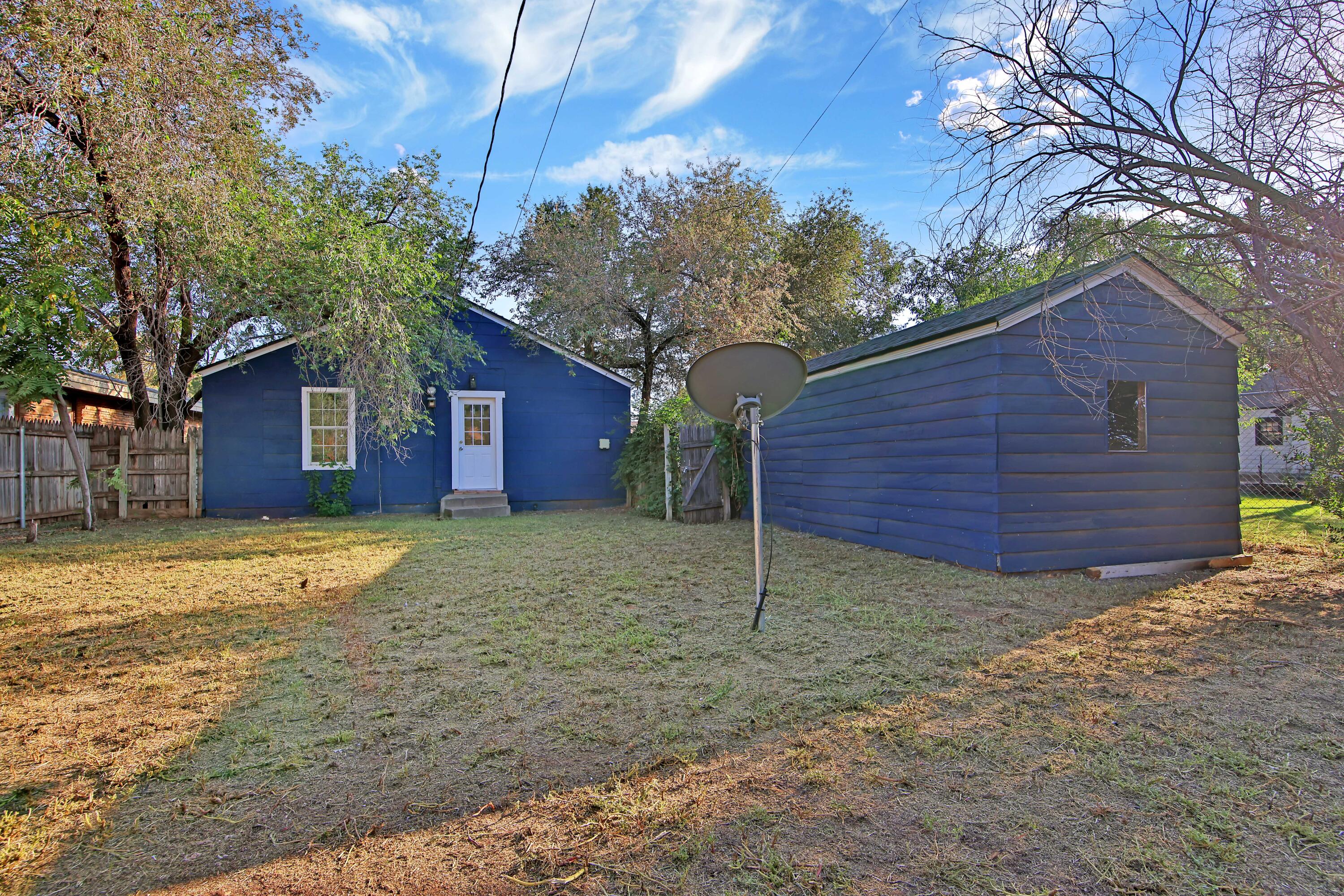 2004 31st Street Lubbock, TX 79411 - Photo 24 of 24 a view of a house with a yard