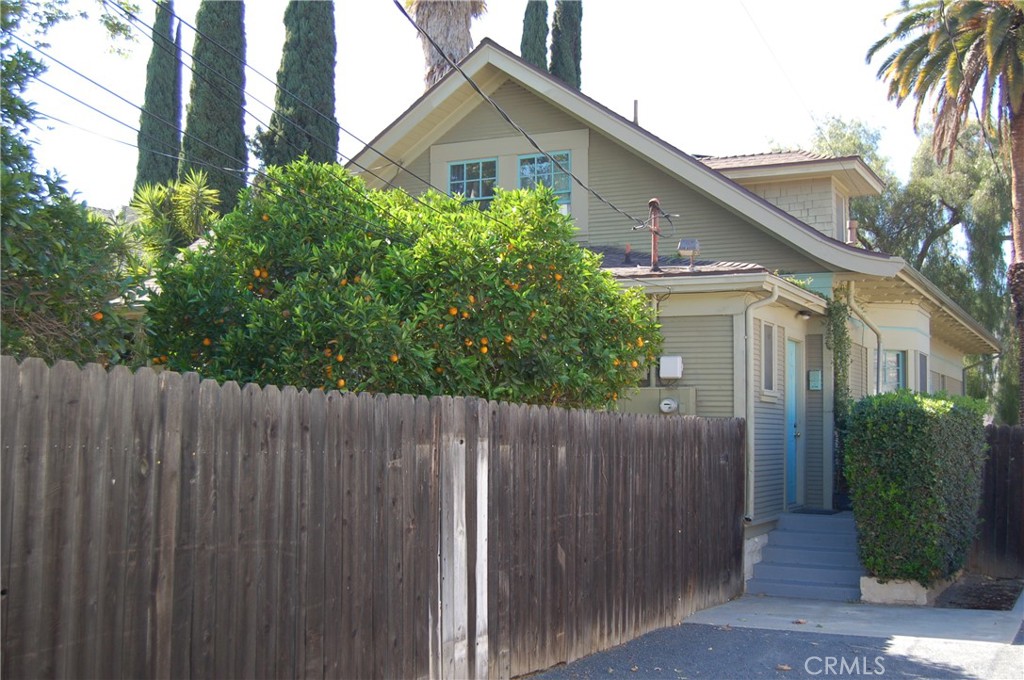 4160 Chestnut Street Riverside, CA 92501 - Photo 29 of 39 a view of a house with wooden fence