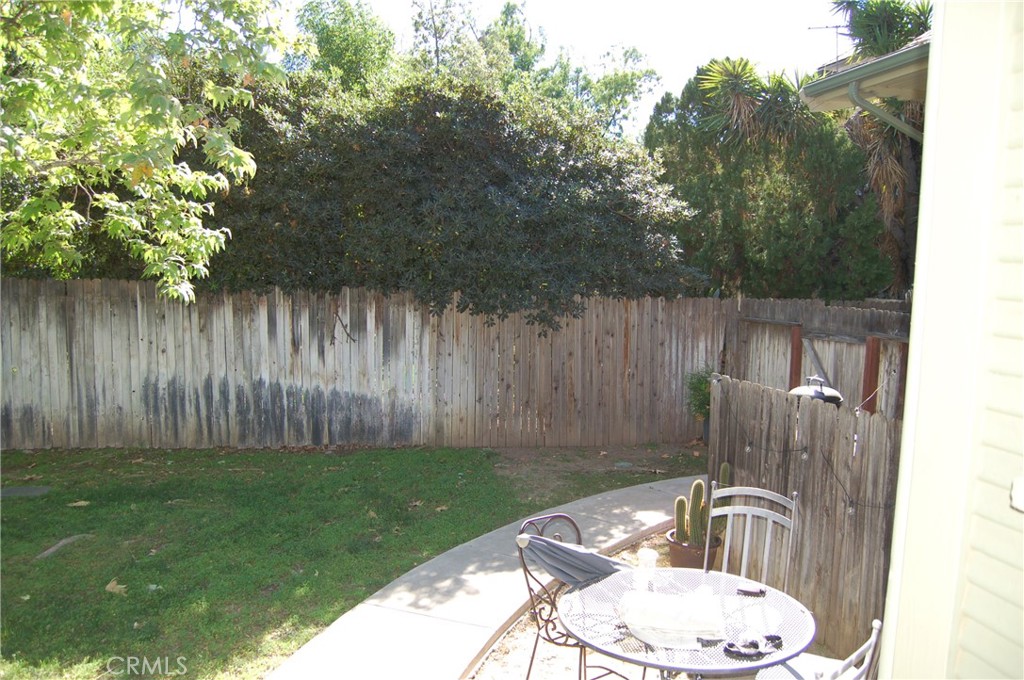 4160 Chestnut Street Riverside, CA 92501 - Photo 33 of 39 a backyard of a house with table and chairs