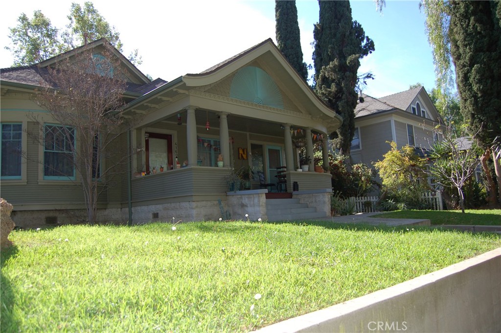 4160 Chestnut Street Riverside, CA 92501 - Photo 4 of 39 a view of a house with a yard