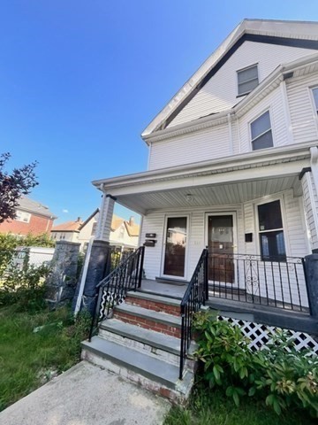 686 River Street, Unit 1 Boston, MA 02136 - Photo 11 of 11 a view of a house with a yard