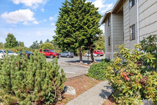a view of a house with a outdoor space and a street