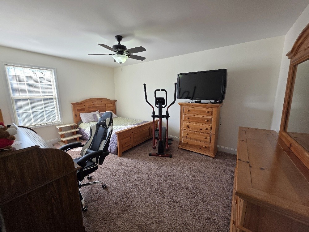 100 Ladybug Lane Bethpage, TN 37022 - Photo 22 of 56 a view of a livingroom with furniture and a flat screen tv