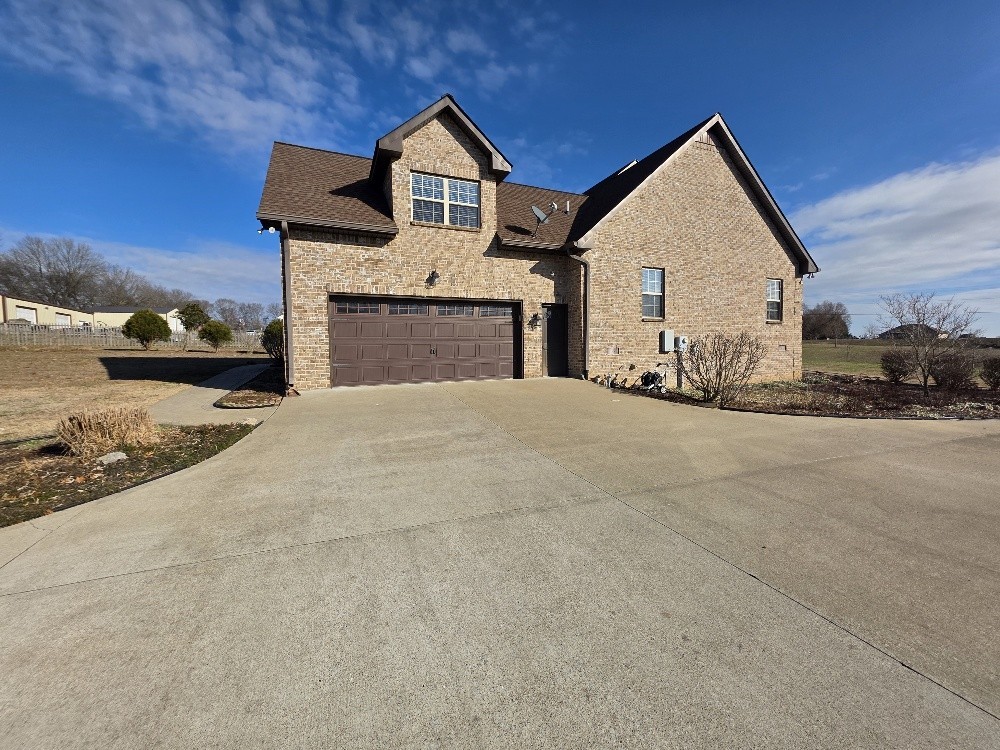 100 Ladybug Lane Bethpage, TN 37022 - Photo 46 of 56 a front view of a house with a yard
