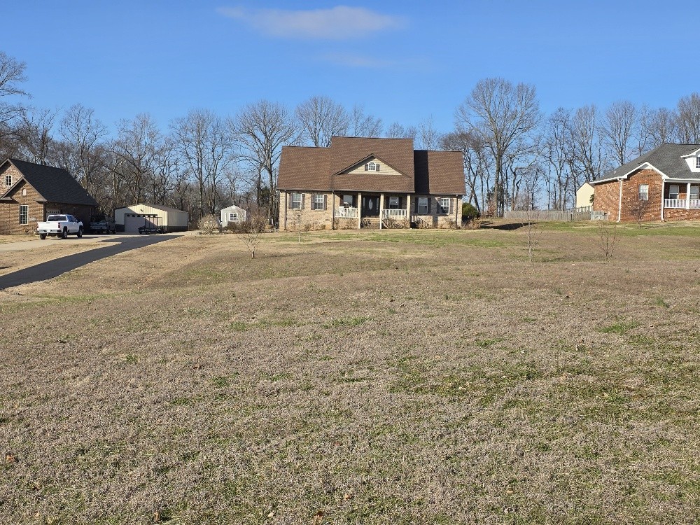 100 Ladybug Lane Bethpage, TN 37022 - Photo 48 of 56 a front view of a house with a yard and mountain view