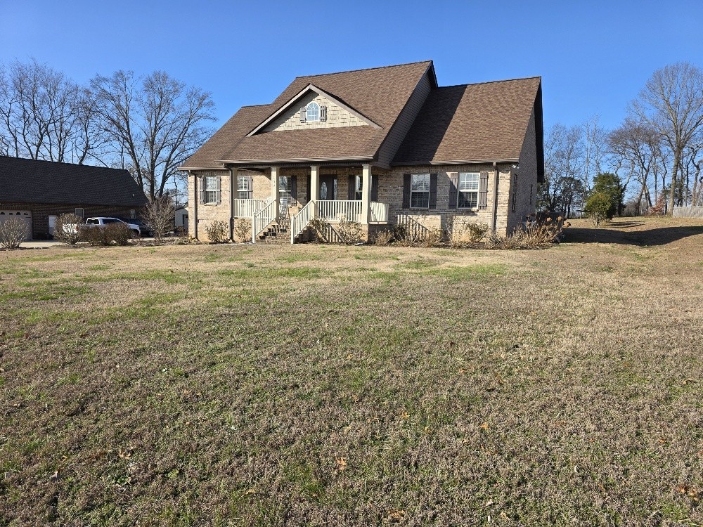 100 Ladybug Lane Bethpage, TN 37022 - Photo 5 of 56 a front view of a house with a garden