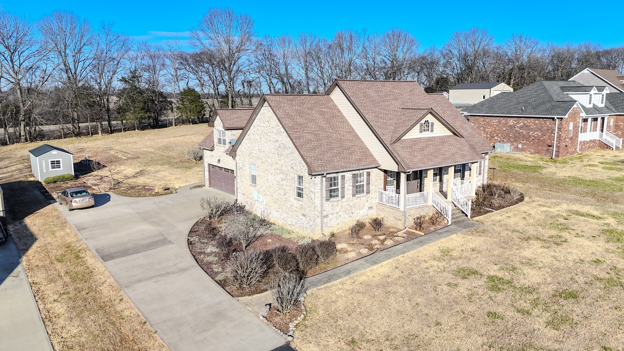 100 Ladybug Lane Bethpage, TN 37022 - Photo 10 of 56 a view of a house with a yard covered in snow